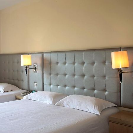 Qingdao Renjia Bussiness Hotel Exterior photo