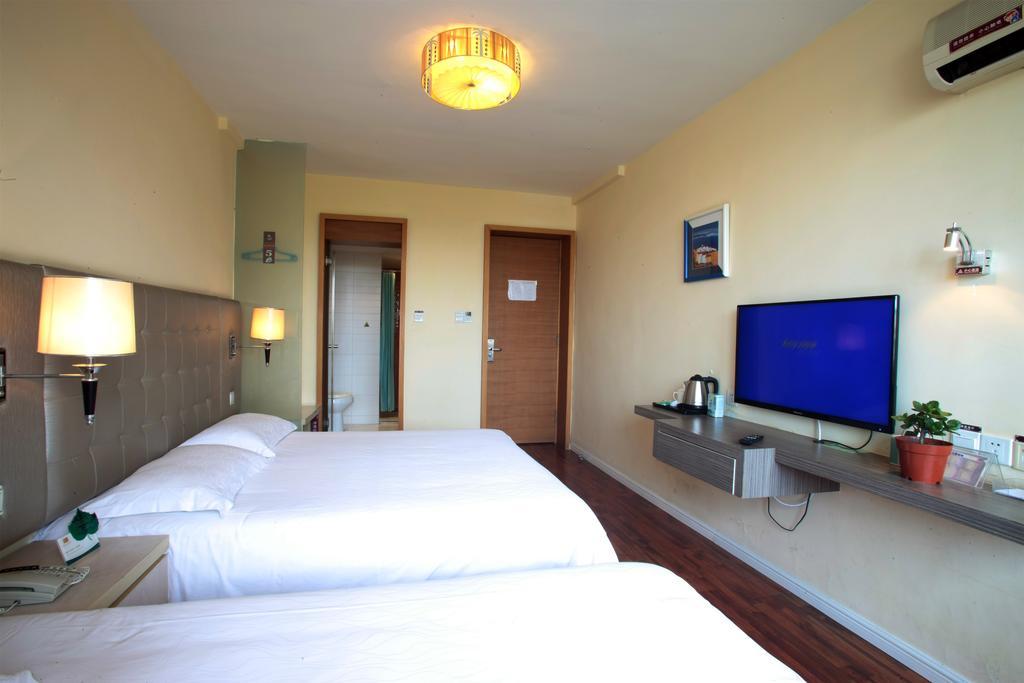 Qingdao Renjia Bussiness Hotel Exterior photo
