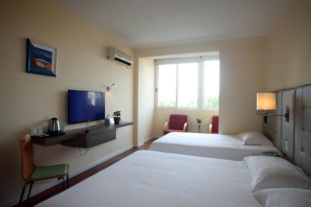 Qingdao Renjia Bussiness Hotel Exterior photo